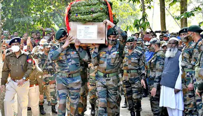 assam rifles attack martyr suman swargiarys last rites by wife and 3 year old son in manipur