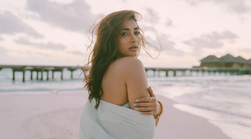 pooja hegde bikini photos blast in internet netizens hot comments
