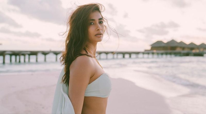 pooja hegde bikini photos blast in internet netizens hot comments