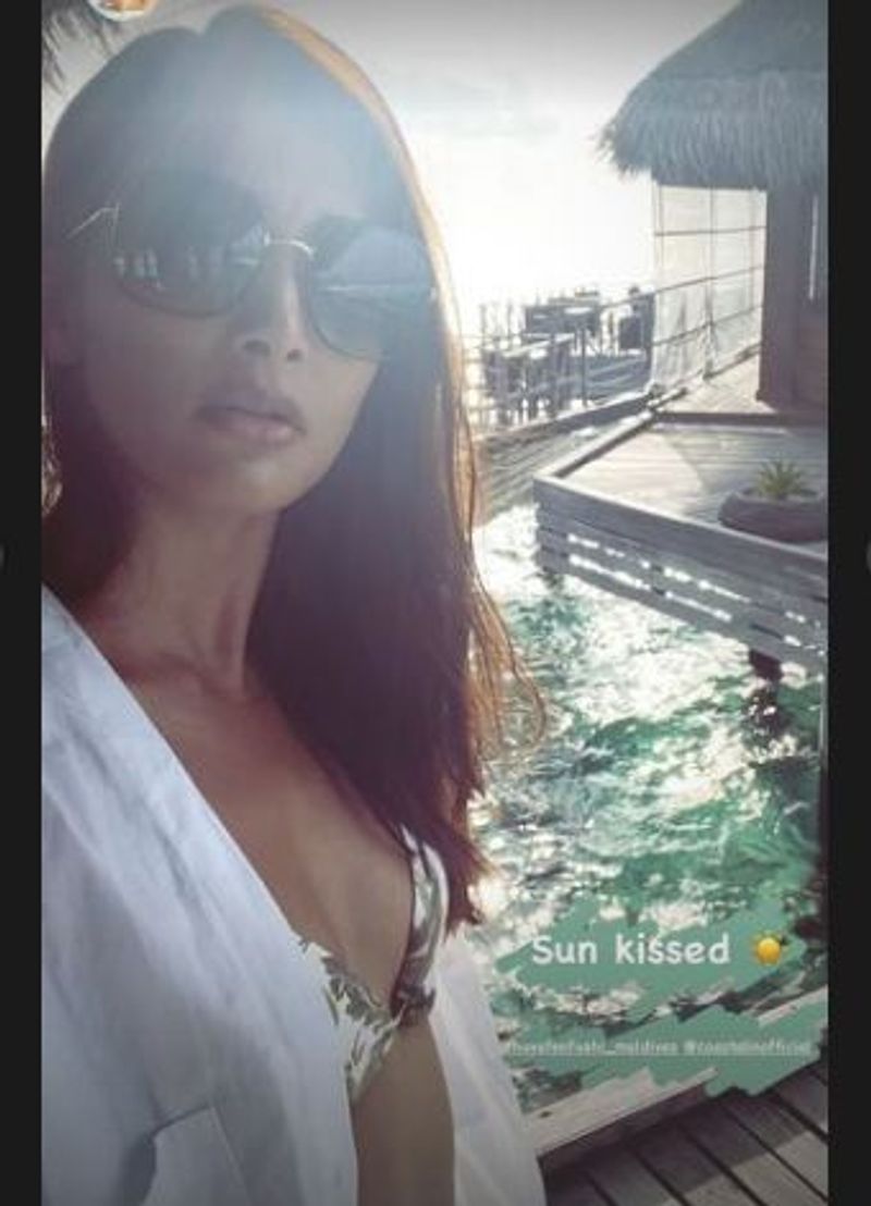 Hottey Actress PoojaHegde enjoying her scuba diving with bikini dress