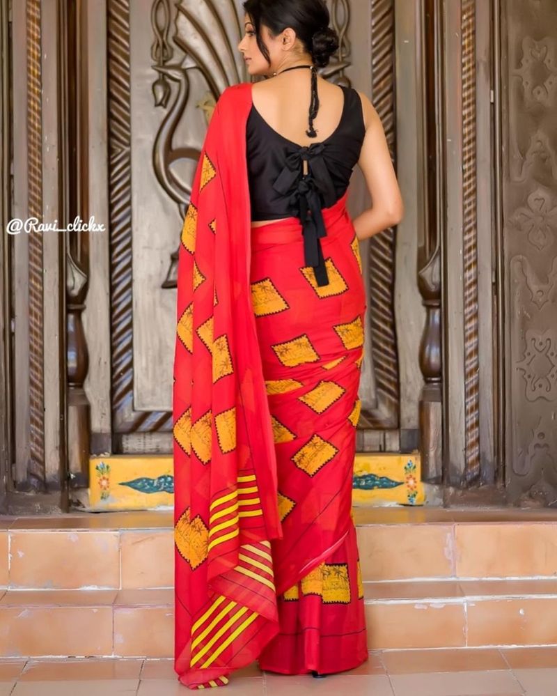 heroin priyamani looks fabulous in sleeveless jacket and designer saree