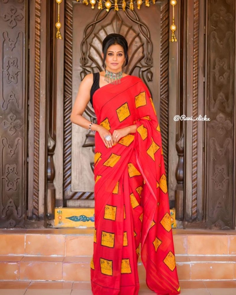 heroin priyamani looks fabulous in sleeveless jacket and designer saree