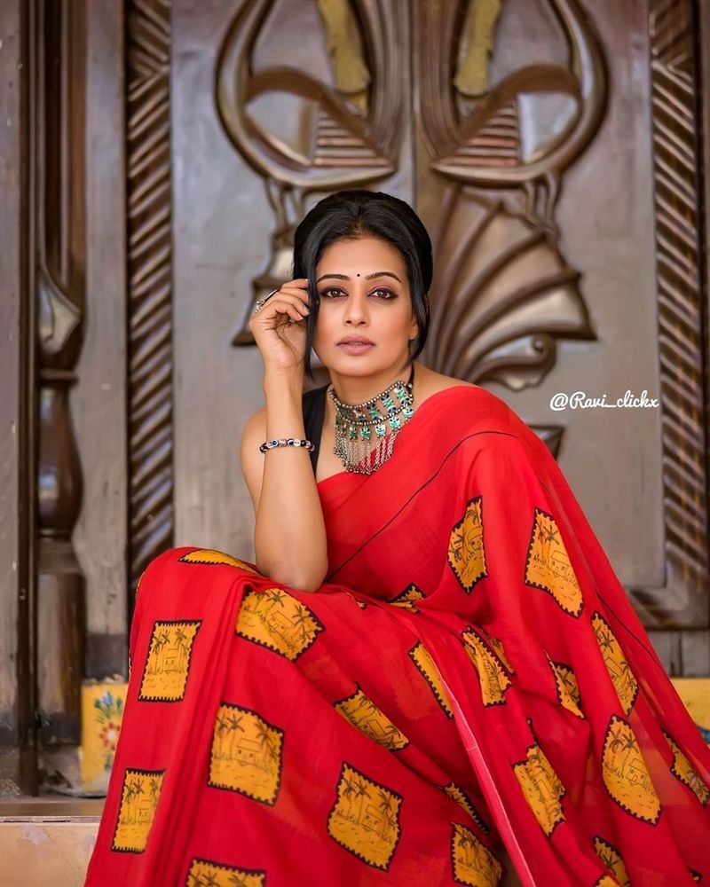 heroin priyamani looks fabulous in sleeveless jacket and designer saree