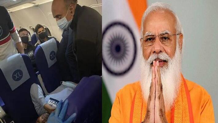 Doctor turned Minister helped unwell passenger in mid air, PM narendra Modi praises Bhagwat Karad Doctor turned Minister helped unwell passenger in mid air, PM narendra Modi praises Bhagwat Karad