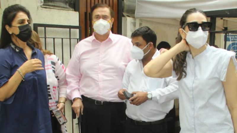malaika arora spotted without makeup outside home, bollywood actress karisma kapoor seen with family KPJ
