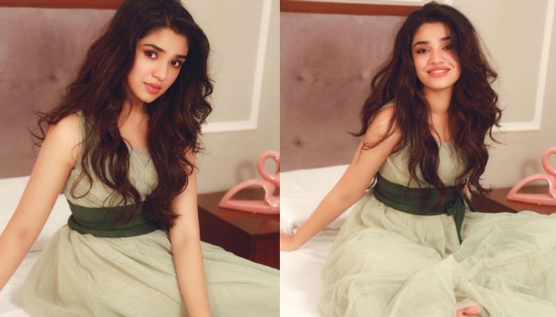 uppena fame krithi shetty hot pose in bed netizens mind blow pics viral
