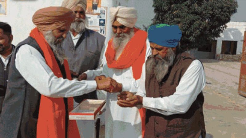 Farm Bills Repealed photos see celebration of farmers dance and joy distributed sweets and Ardas UDT