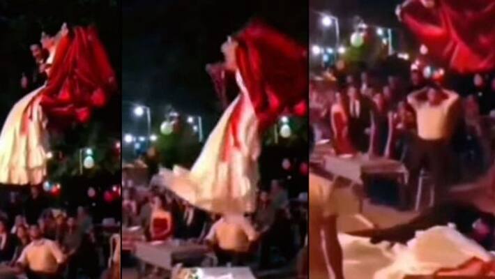 viral video of Bride and groom fall from a crane viral video of Bride and groom fall from a crane