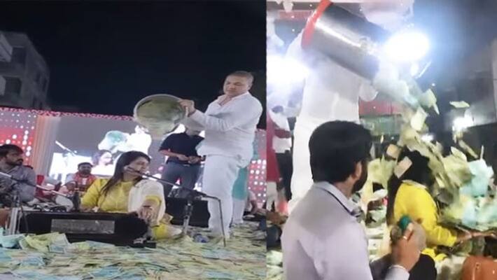 Gujarati singer urvashi radadiya showered with bundles of notes watch video NTP Gujarati singer urvashi radadiya showered with bundles of notes watch video NTP