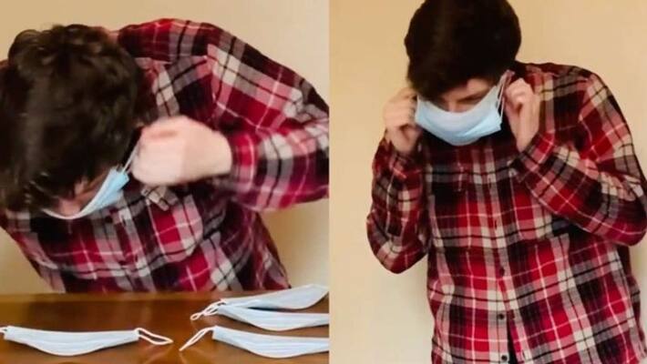 Boy wears 10 masks in 7.35 seconds enters Guinness World Record Boy wears 10 masks in 7.35 seconds enters Guinness World Record