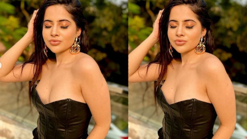 bigg boss ott fame urfi javed shares photos in black dress goes viral NTP