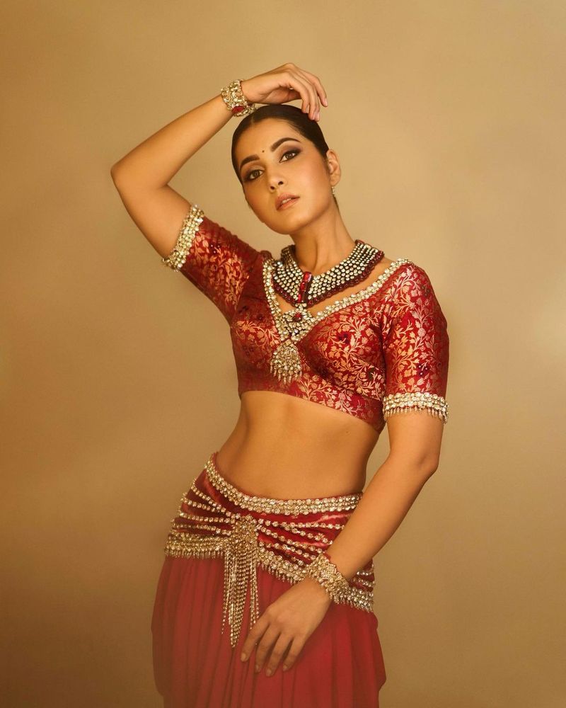 heroin raashi khanna shines in yellow frack her she looks too hot