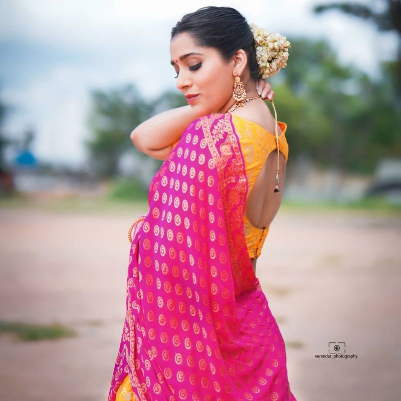 anchor rashmi gautam wears half saree and deep neck jacket her mesmerising poses goes viral