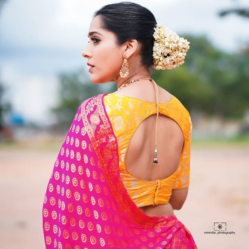 anchor rashmi gautam wears half saree and deep neck jacket her mesmerising poses goes viral