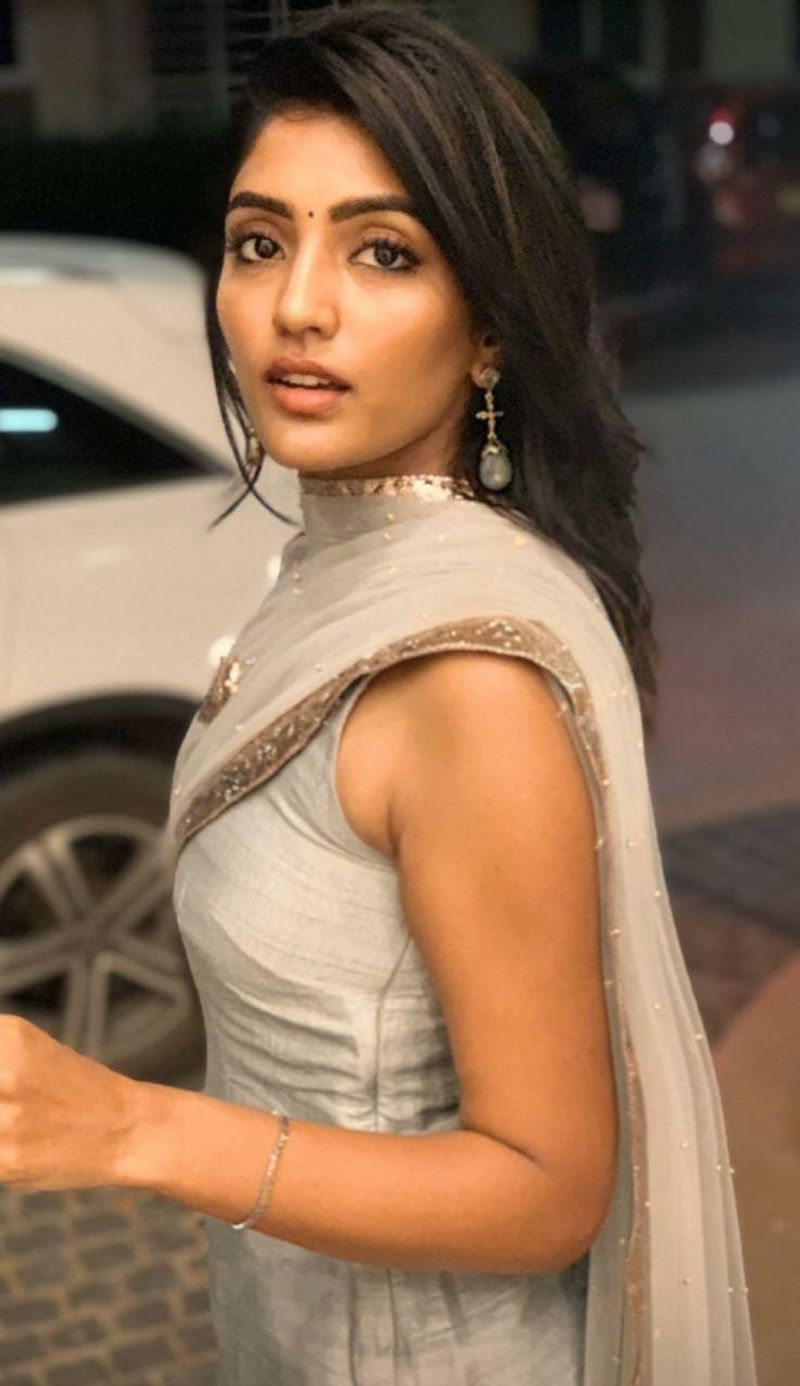 eesha rebba in whight dress hot poses like sunny leon netizens comments viral