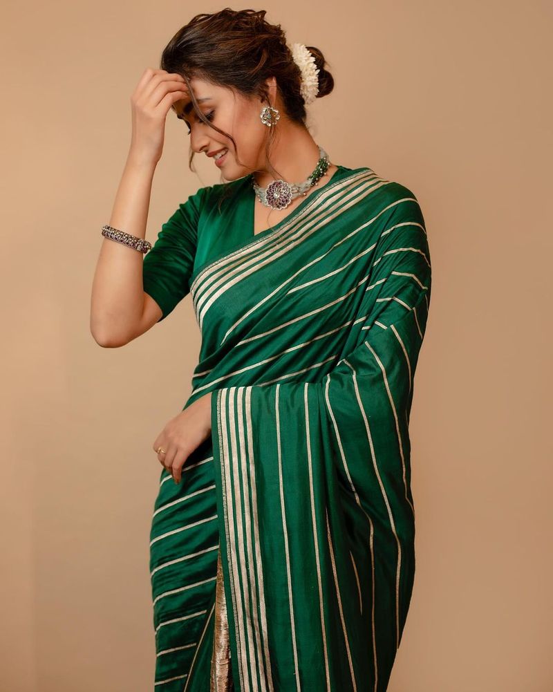 sarkaru vaari paata fame keerthy suresh looks adorable in green saree