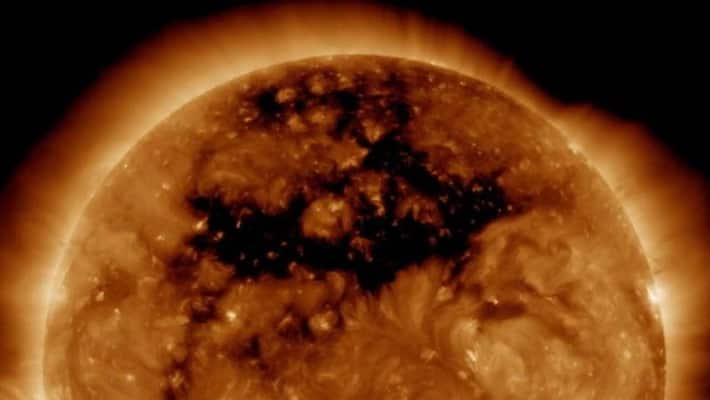Giant hole on Sun surface Earth in danger of facing massive solar storm Giant hole on Sun surface Earth in danger of facing massive solar storm