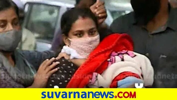 Kerala Anupama and Ajith get justice baby on mothers lap parents won battle pod Kerala Anupama and Ajith get justice baby on mothers lap parents won battle pod