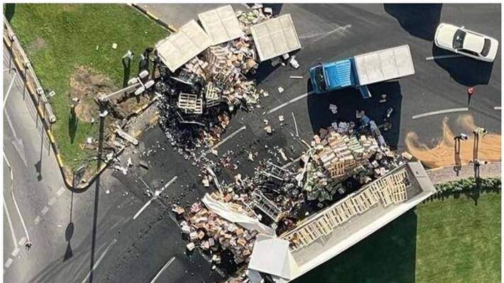 Expat driver sustains major injuries as loaded truck flips in road accident in UAE Expat driver sustains major injuries as loaded truck flips in road accident in UAE