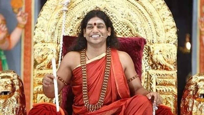 A father has complaint with the Thiruvannamalai Police demanding the release of his daughter from the Nithyananda Ashram