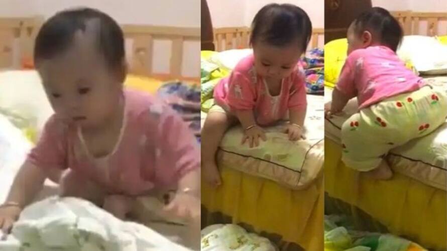 Baby uses a Genius Technique to Get Off the Bed in a viral video Baby uses a Genius Technique to Get Off the Bed in a viral video