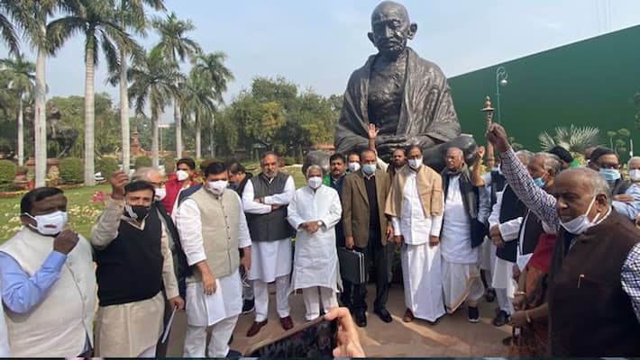 Opposition stages walkout after Venkaiah Naidu refuses to revoke suspension of 12 Rajya Sabha MPs Opposition stages walkout after Venkaiah Naidu refuses to revoke suspension of 12 Rajya Sabha MPs