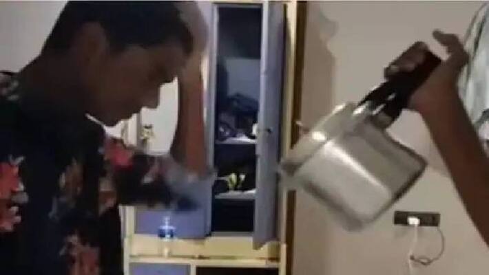 man using pressure cooker to dry his hair man using pressure cooker to dry his hair