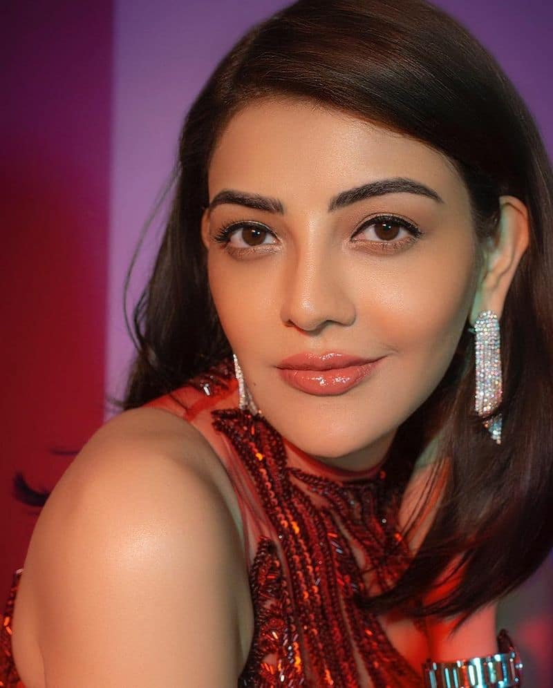 kajal blast with her hot look in red pre draped saree photos trending