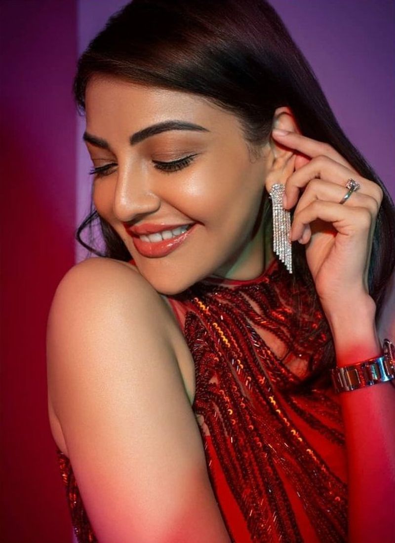 kajal blast with her hot look in red pre draped saree photos trending