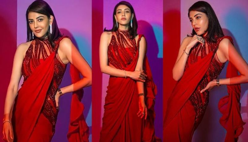 kajal blast with her hot look in red pre draped saree photos trending