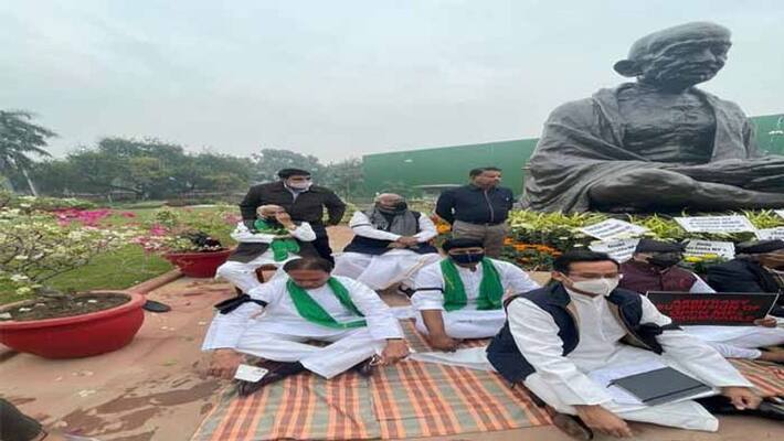Trs MPs hold protest in front of Gandhi Statue in Parliament premises Trs MPs hold protest in front of Gandhi Statue in Parliament premises