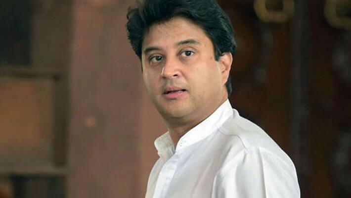 Emergency Door Opened by Mistake Aviation minister Jyotiraditya Scindia on Tejasvi Surya opening emergency door of flight Emergency Door Opened by Mistake Aviation minister Jyotiraditya Scindia on Tejasvi Surya opening emergency door of flight