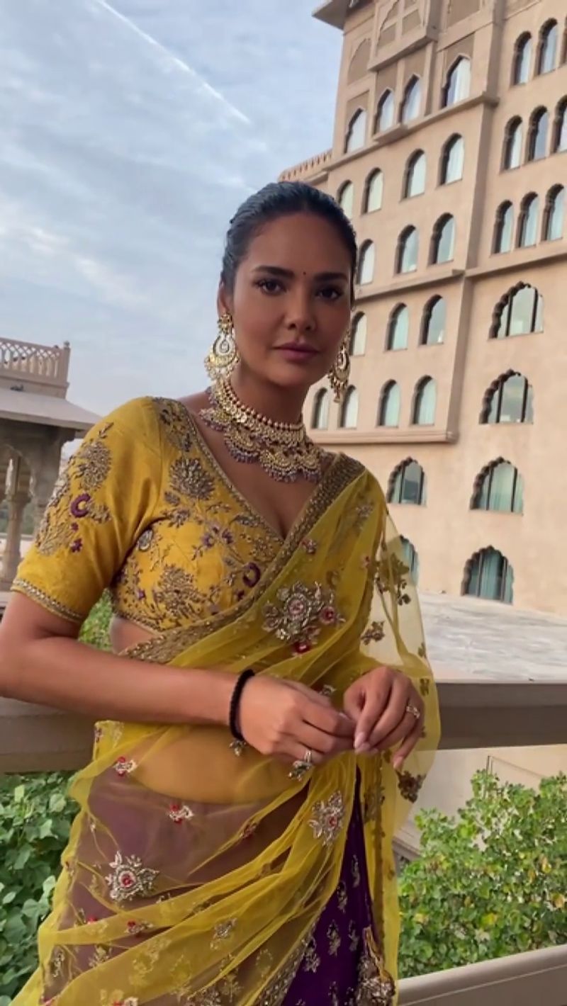 Esha Gupta stuns her fans in yellow half saree