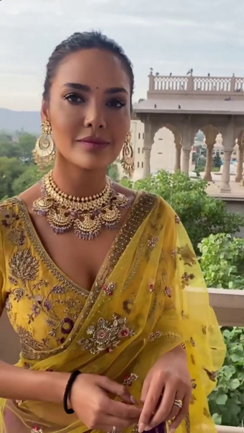 Esha Gupta stuns her fans in yellow half saree