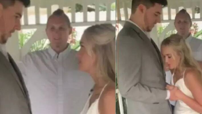 Bride faints on groom during wedding ceremony Bride faints on groom during wedding ceremony