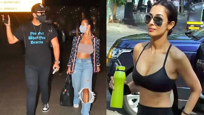 Malaika Arora trolled for her ripped Jeans in mumbai airport kpg Malaika Arora trolled for her ripped Jeans in mumbai airport kpg