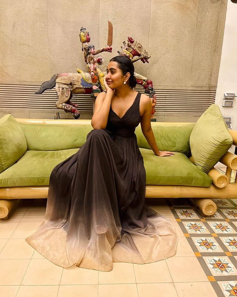 shivathmika tempting poses in sleeveless black gown latest pics goes viral
