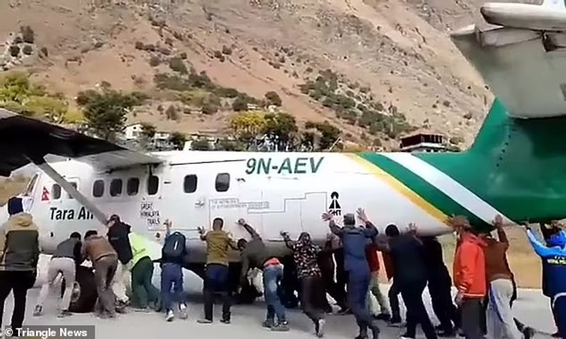 plane Tires bursts in Bajura Airport passengers push the plane away from the runway
