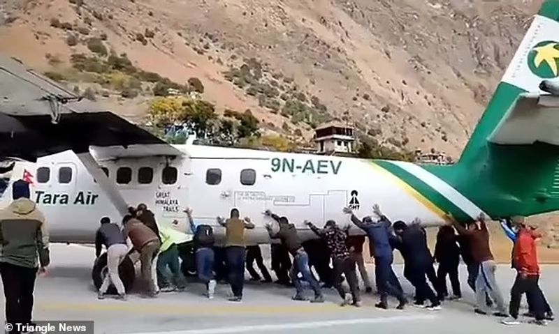 plane Tires bursts in Bajura Airport passengers push the plane away from the runway