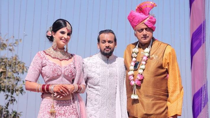 Shashi Tharoor mistaken as groom in pic with newlyweds Shashi Tharoor mistaken as groom in pic with newlyweds