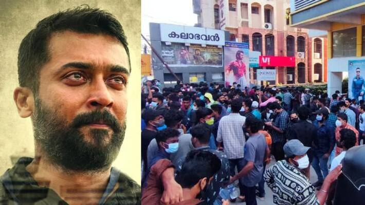 Fans celebrate suriyas soorarai pottru release in kerala theatres Fans celebrate suriyas soorarai pottru release in kerala theatres