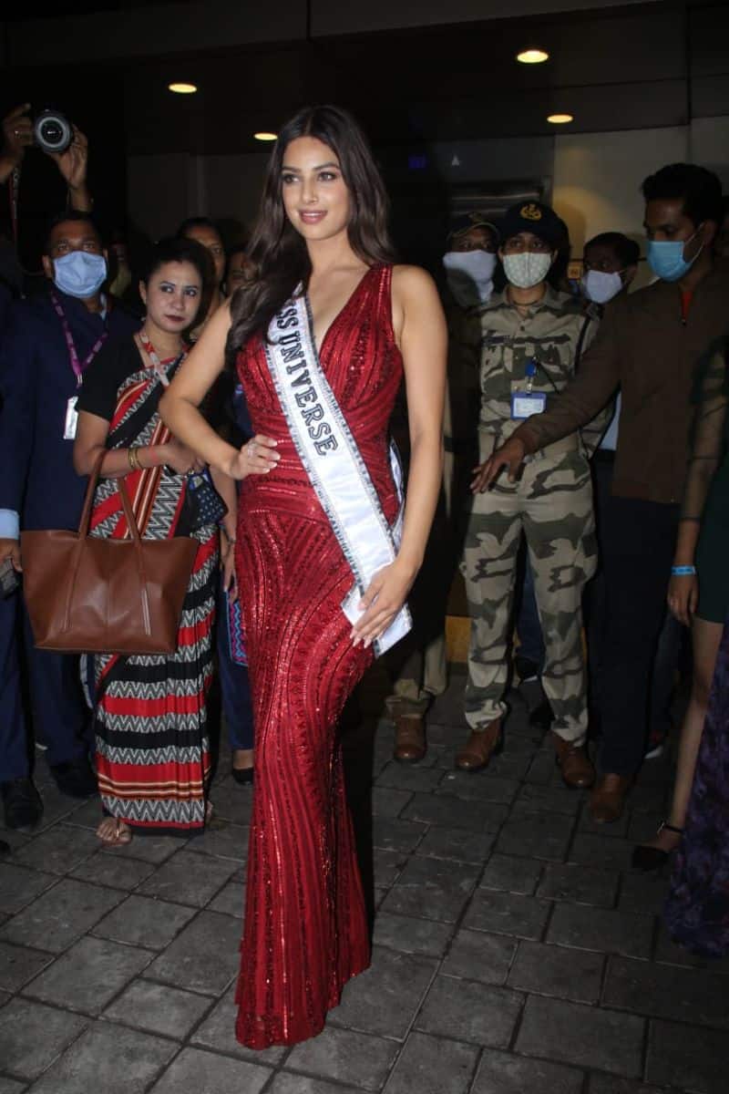 Miss Universe 2021 Harnaaz Sandhu dons stunning red gown poses with Indian flag at Mumbai airport RCB