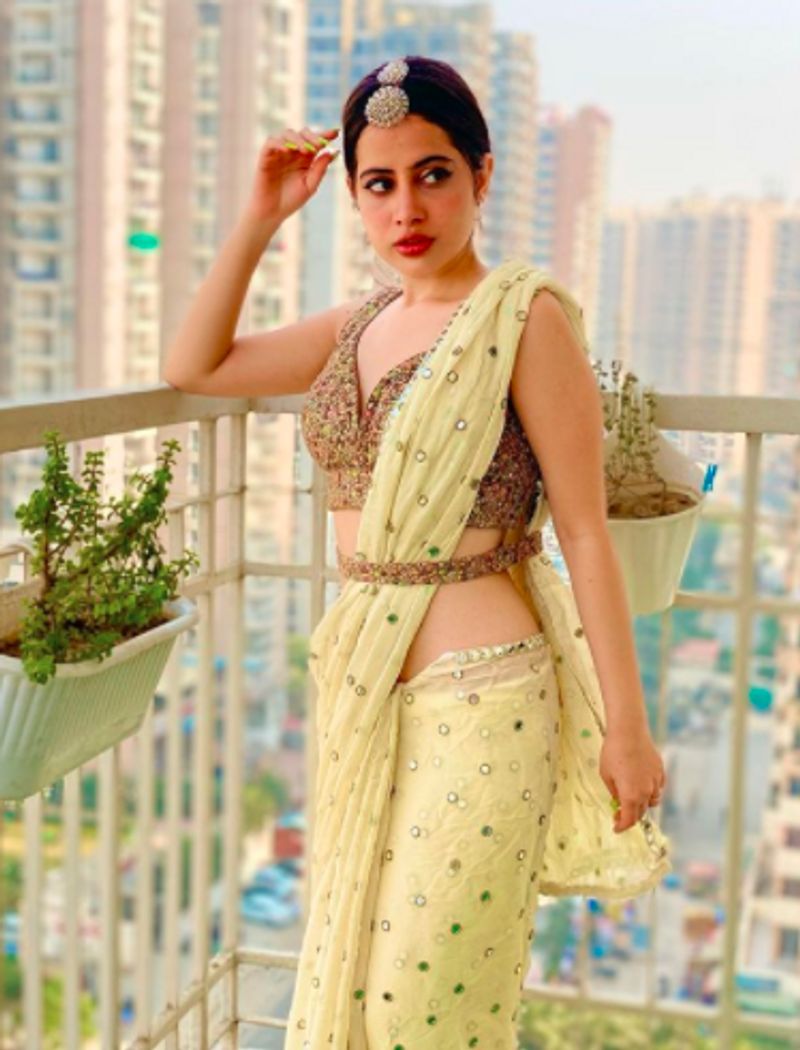 Urfi Javed saree styles actress hot looks in traditional attire dpl