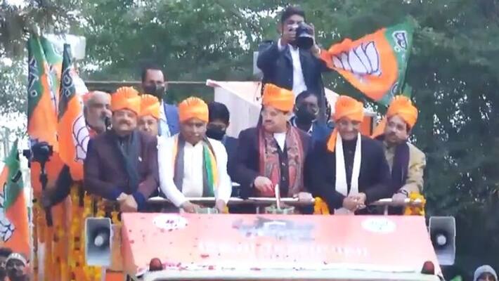 Uttarakhand Election 2022: BJP holds 'Vijay Sankalp Yatra' in Kumaon led by Minister Anurag Thakur, CM Dhami-dnm Uttarakhand Election 2022: BJP holds 'Vijay Sankalp Yatra' in Kumaon led by Minister Anurag Thakur, CM Dhami-dnm