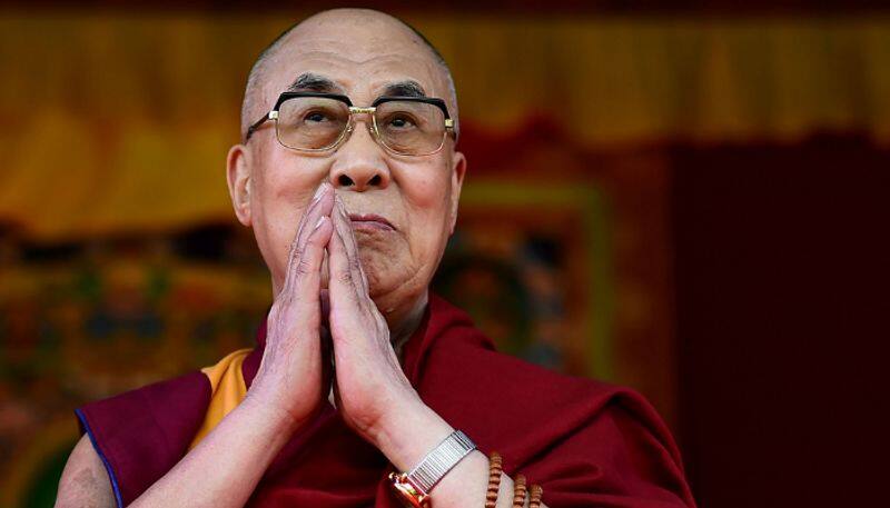 Tibetan Spitual leader Dalai Lamacalled India a role model of religious harmony in the world.