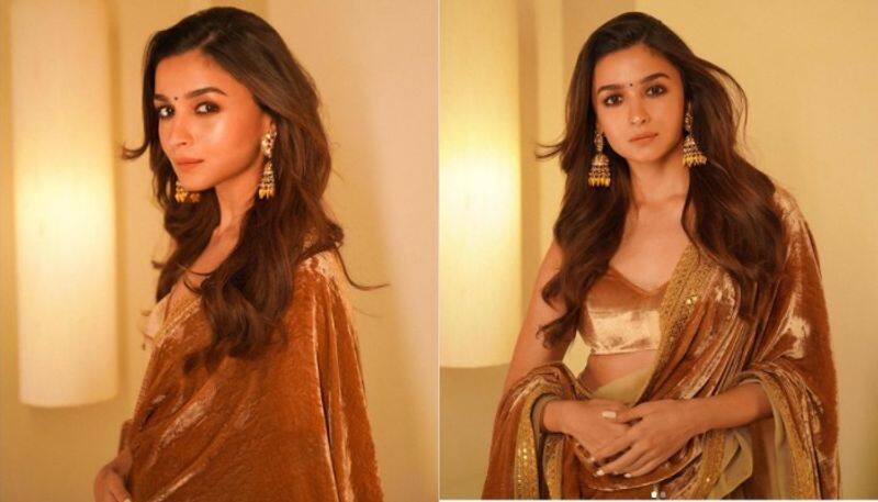 Golden girl Alia Bhatt looks in Sabyasachi lehenga