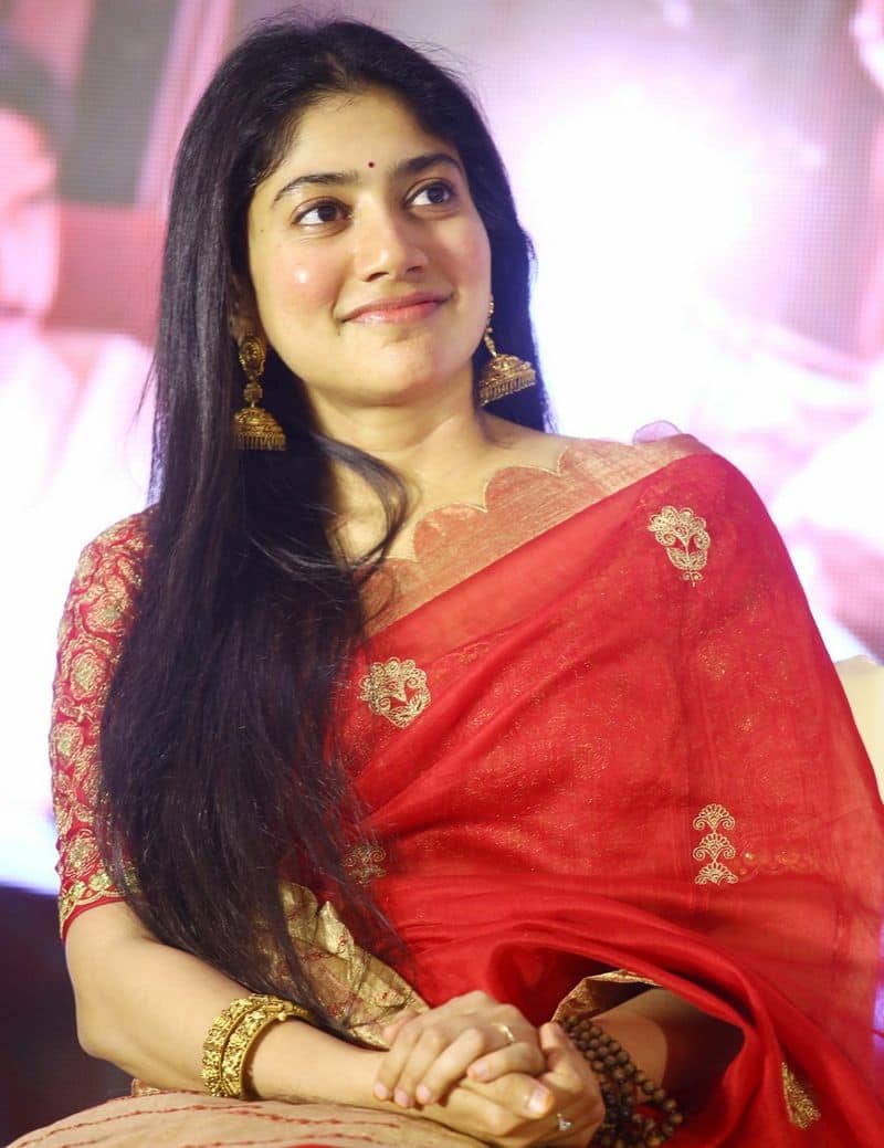 Actress SaiPallavi slaying magic style in red saree photos