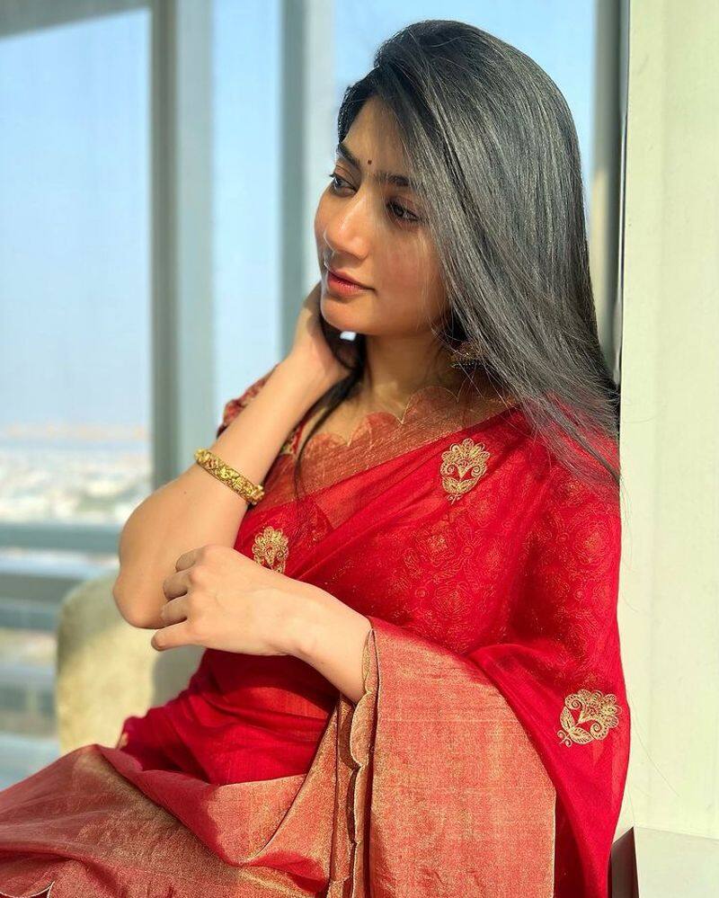 Actress SaiPallavi slaying magic style in red saree photos