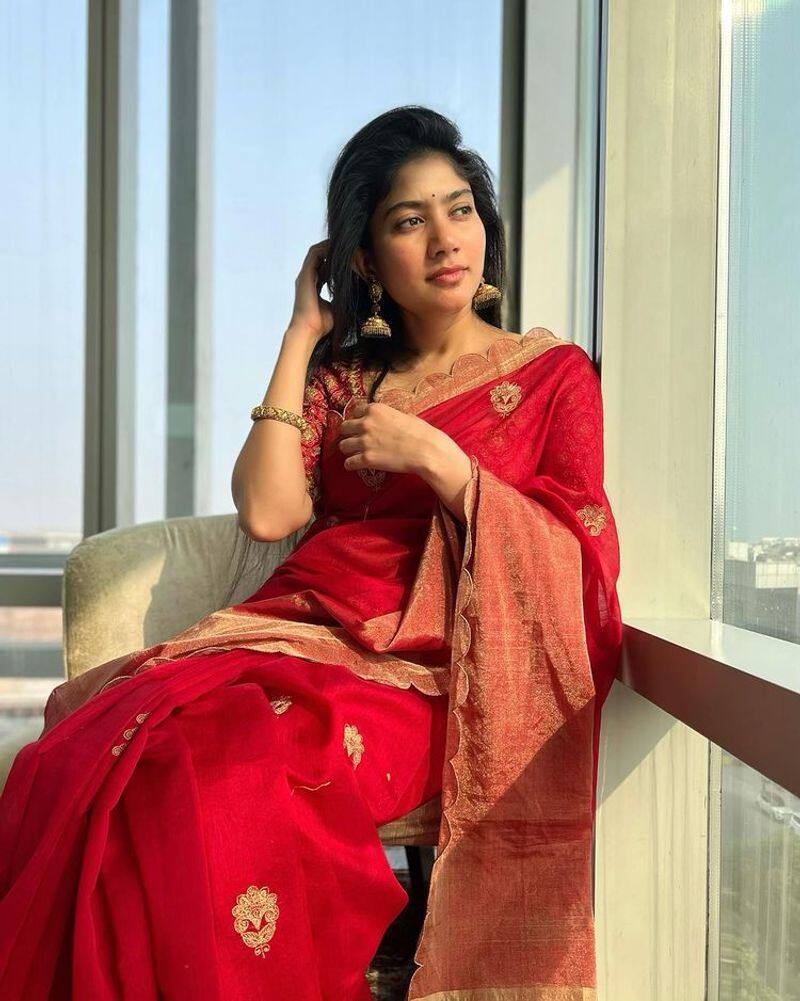 Actress SaiPallavi slaying magic style in red saree photos