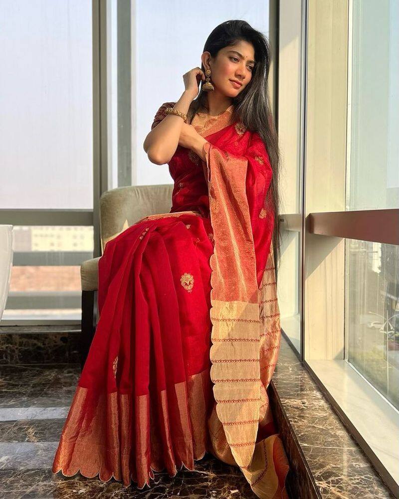 Actress SaiPallavi slaying magic style in red saree photos